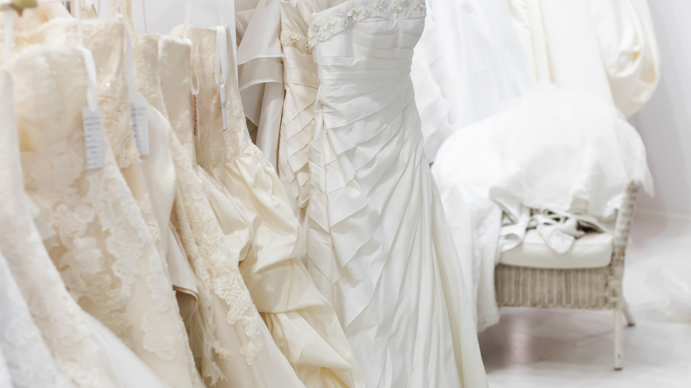 a rack of bridal gowns to symbolizes how to love like jesus