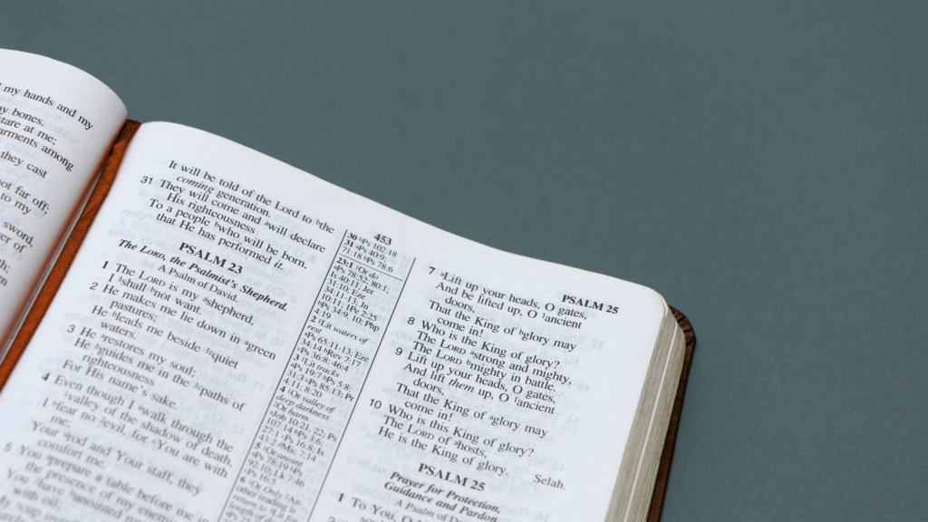 A Bible open to Psalm 23 with a cross-reference column