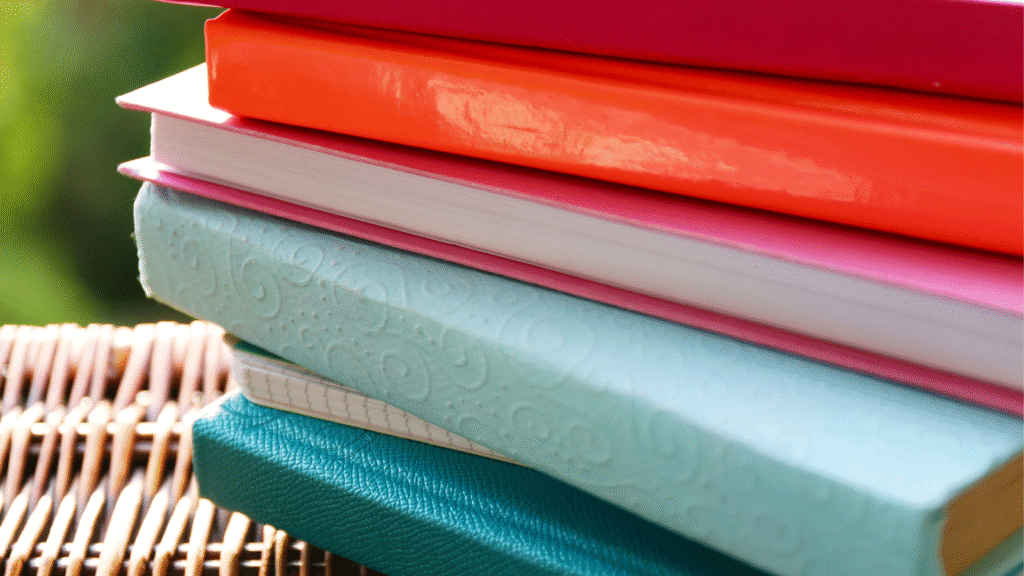 Brightly colored stack of journals