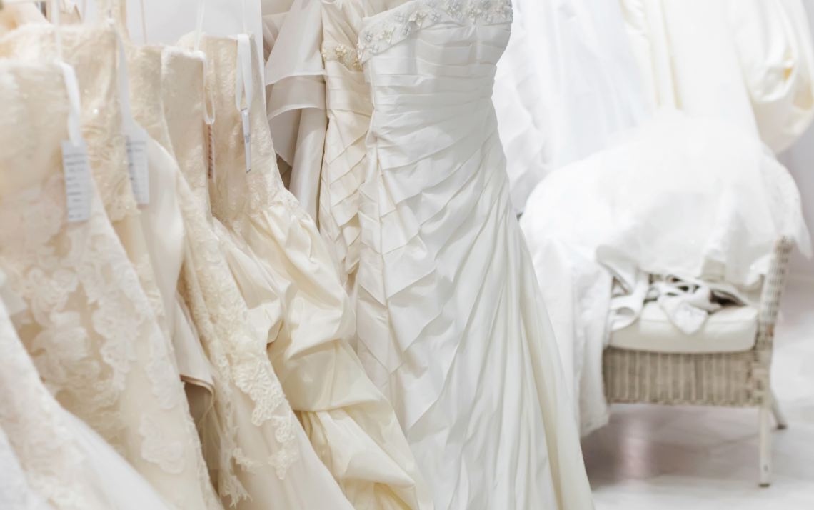 a rack of bridal gowns to symbolizes how to love like jesus